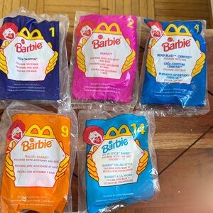 VintageBarbie Collectible Toy Set with Purple, Pink, Orange, and Blue Packaging